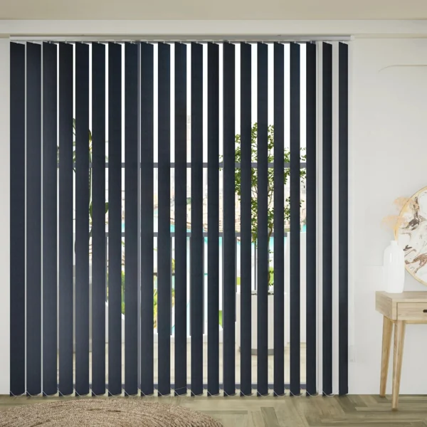 Dark grey vertical blinds covering a large window.