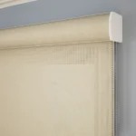 Detail of dark gray slats and bottom rail with cord