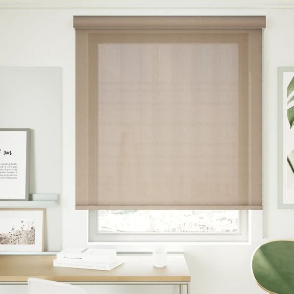 Neutral sunscreen roller blind in a modern home office